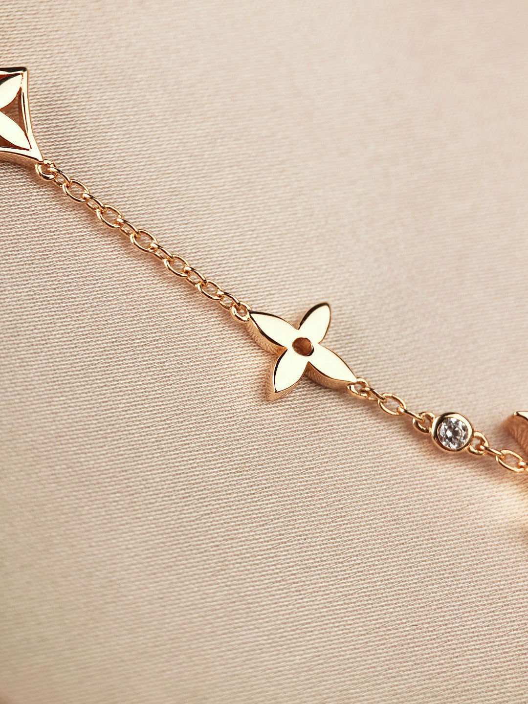 [CA]STAR AND SUN 7 MOTIFS GOLD BRACELET