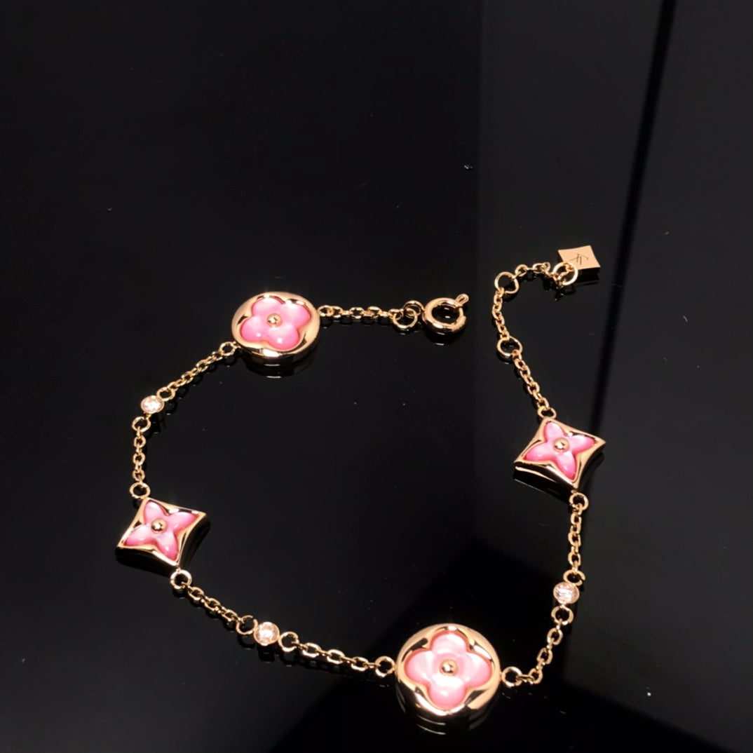 [CA]STAR AND SUN 4 MOTIF PINK MOP PINK GOLD BRACELET