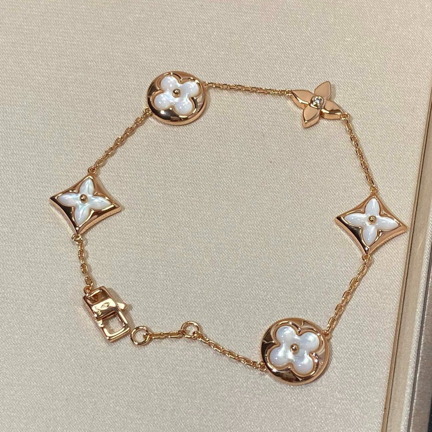 [CA]STAR AND SUN 5 MOTIF MOP PINK GOLD BRACELET