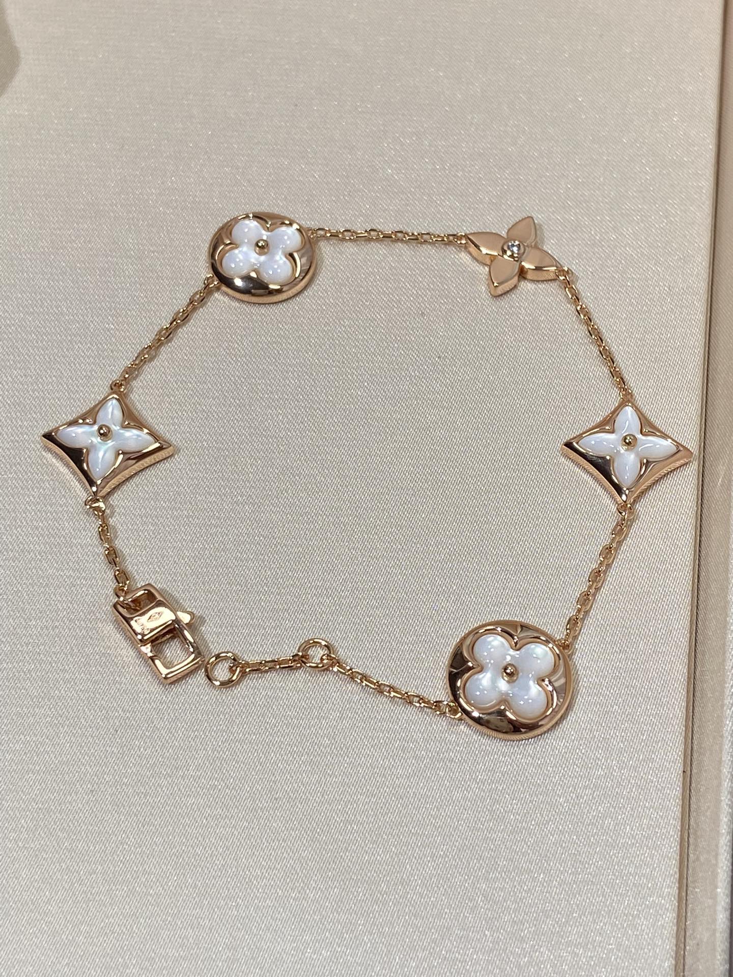 [CA]STAR AND SUN 5 MOTIF MOP PINK GOLD BRACELET