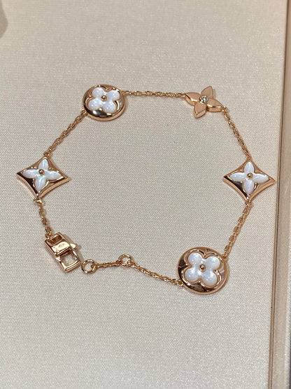 [CA]STAR AND SUN 5 MOTIF MOP PINK GOLD BRACELET