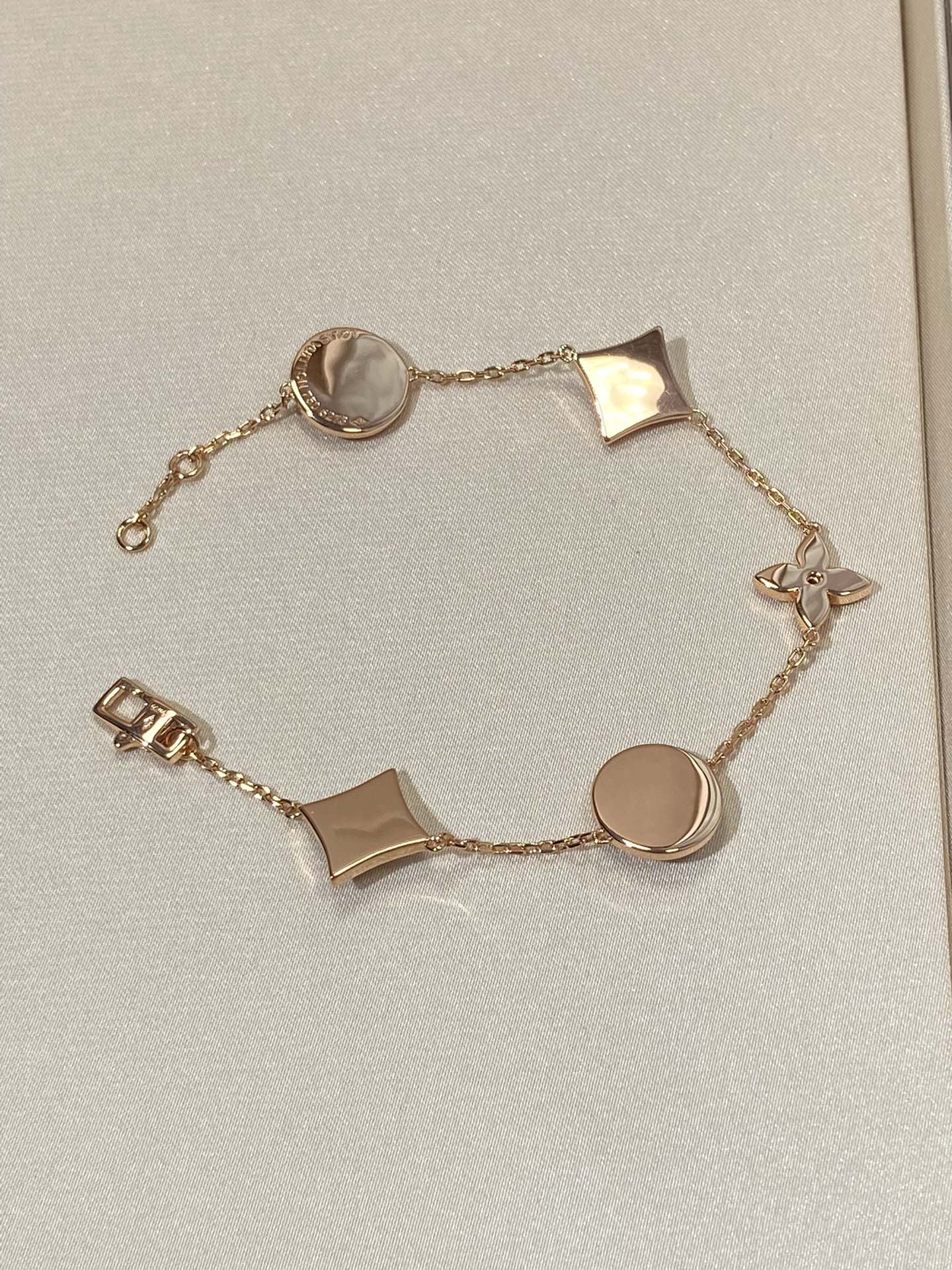 [CA]STAR AND SUN 5 MOTIF MOP PINK GOLD BRACELET