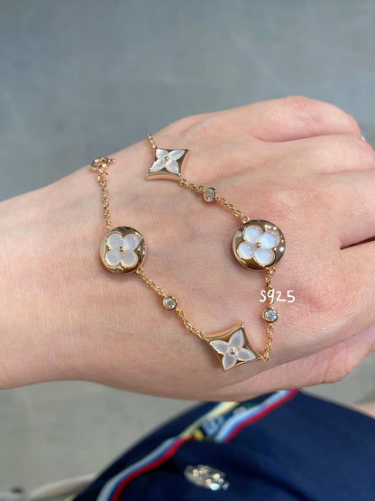 [CA]STAR AND SUN 4 MOTIF WHITE MOP PINK GOLD BRACELET