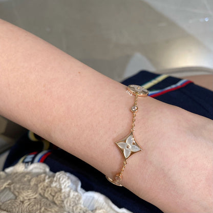 [CA]STAR AND SUN 4 MOTIF WHITE MOP PINK GOLD BRACELET