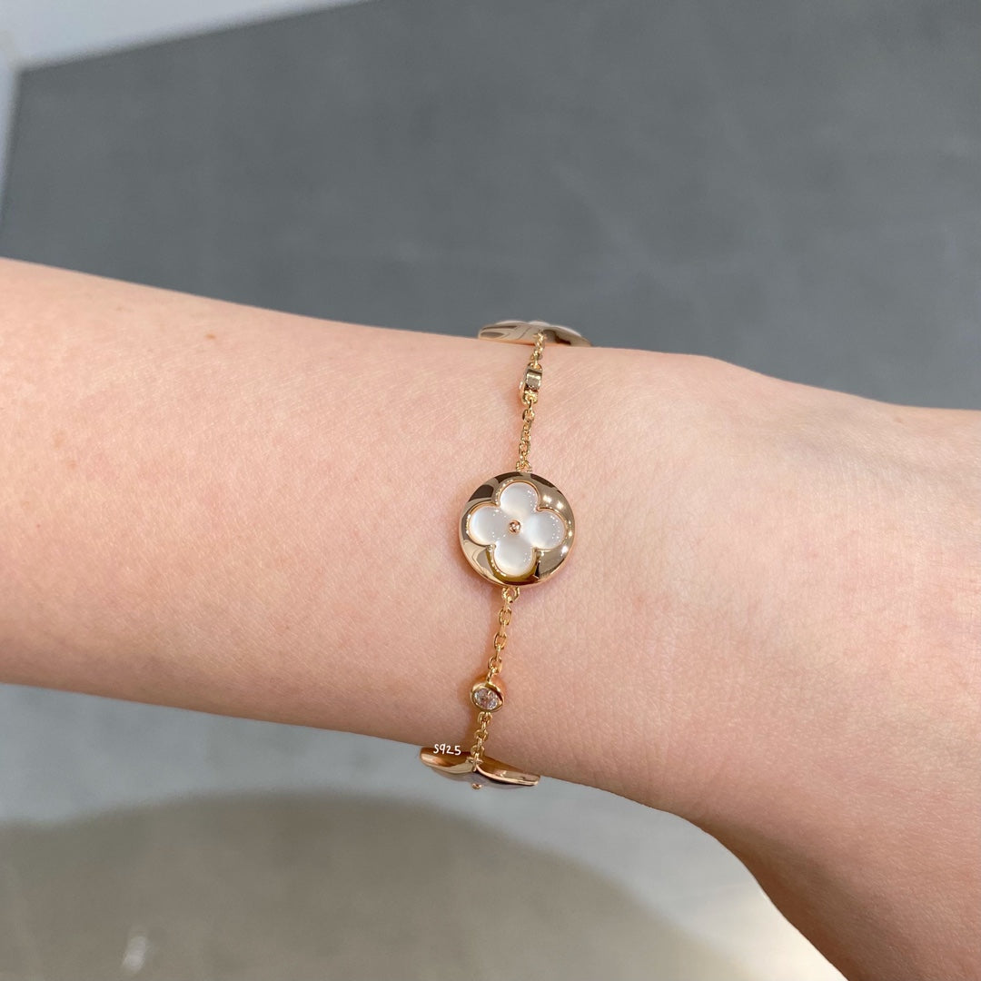 [CA]STAR AND SUN 4 MOTIF WHITE MOP PINK GOLD BRACELET