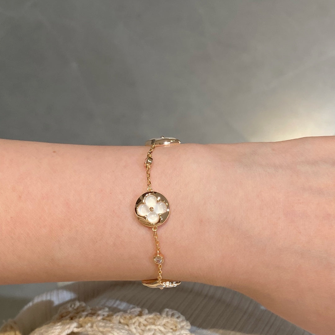 [CA]STAR AND SUN 4 MOTIF WHITE MOP PINK GOLD BRACELET