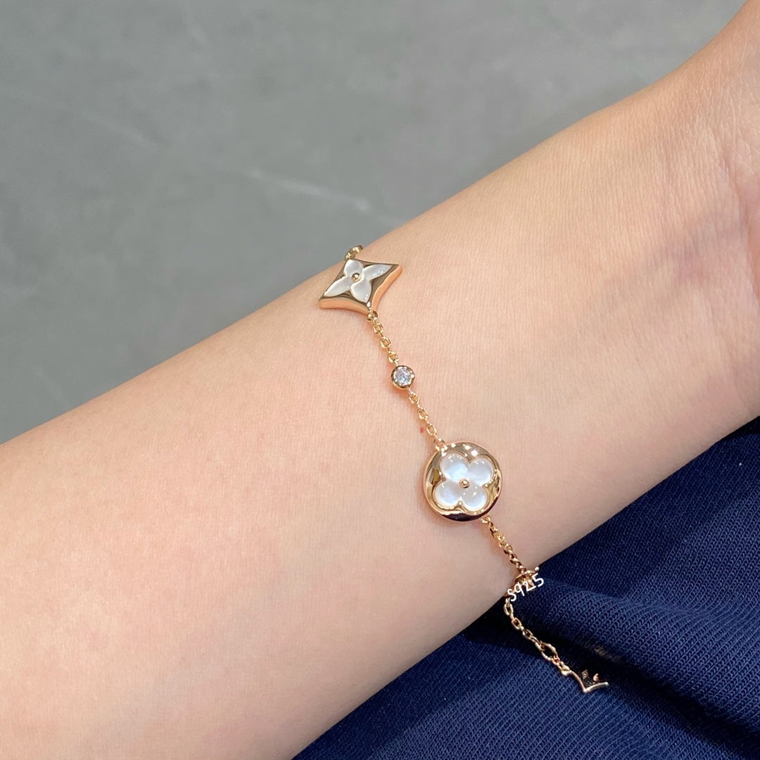 [CA]STAR AND SUN 4 MOTIF WHITE MOP PINK GOLD BRACELET