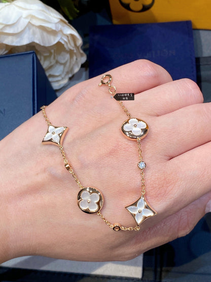 [CA]STAR AND SUN 4 MOTIF WHITE MOP PINK GOLD BRACELET