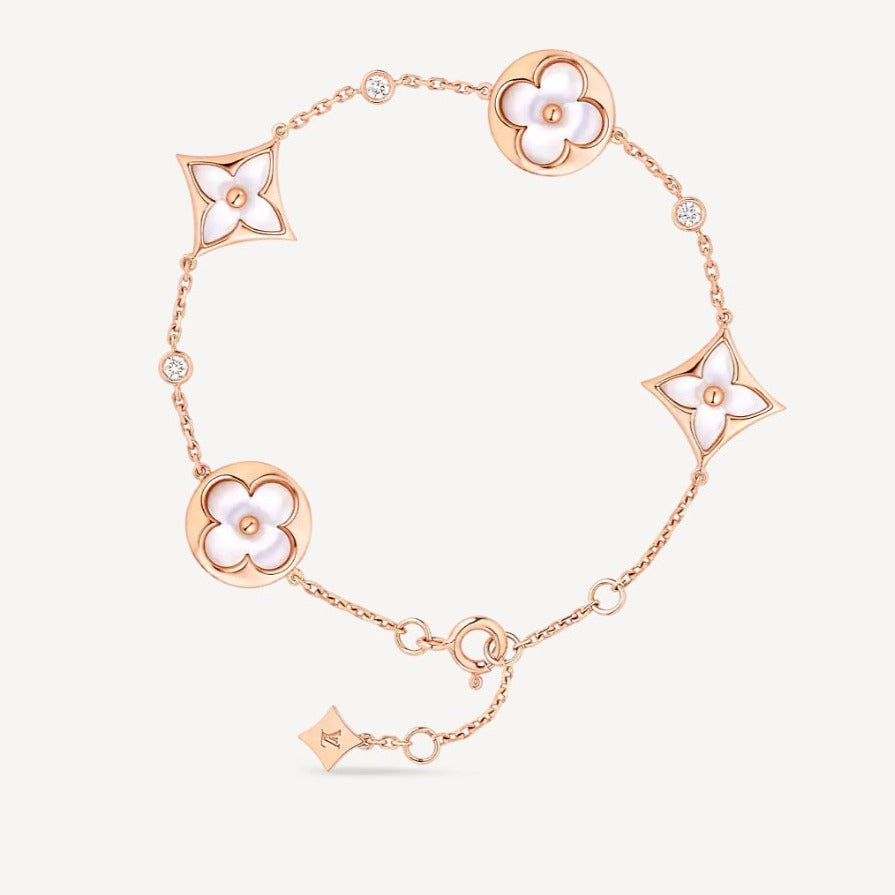 [CA]STAR AND SUN 4 MOTIF WHITE MOP PINK GOLD BRACELET