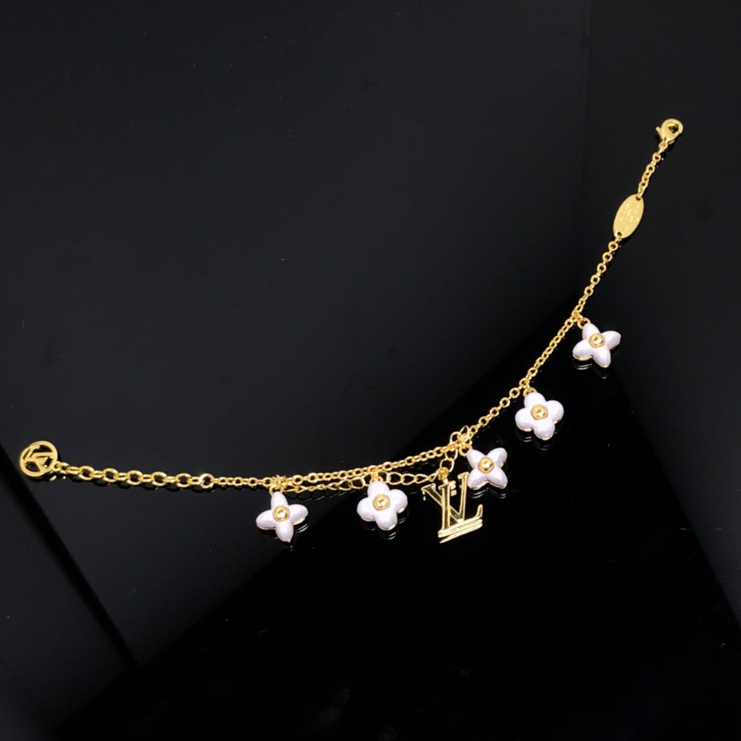 [CA]LOGO 6 MOTIF STAR AND SUN GOLD BRACELET