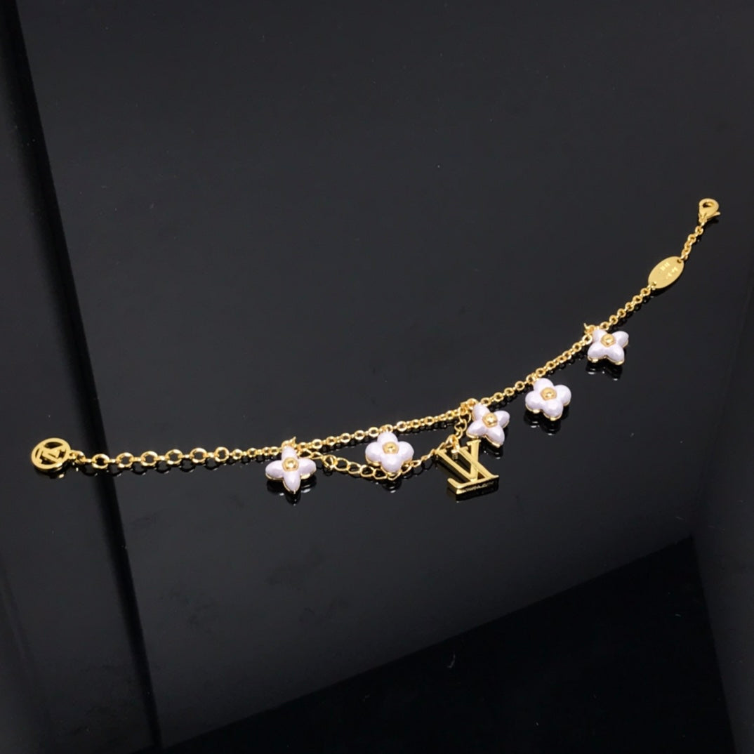 [CA]LOGO 6 MOTIF STAR AND SUN GOLD BRACELET