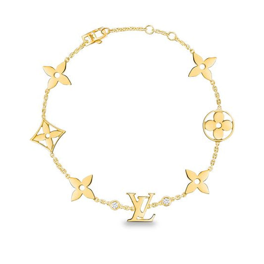 [CA]STAR AND SUN 7 MOTIFS GOLD BRACELET