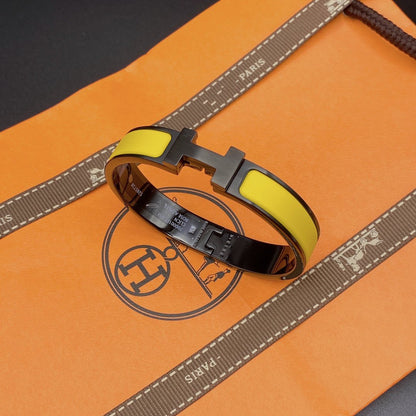 [CA]CLIC HM SO BLACK YELLOW BRACELET